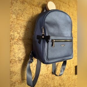 Limited edition Kipling Amory backpack in Sea Blue Metallic